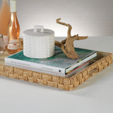 Abaca Rope Serving Tray with stack of books and covered jar