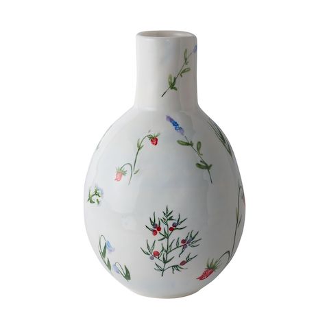 Accent Decor White vase with flowers and strawberries on it