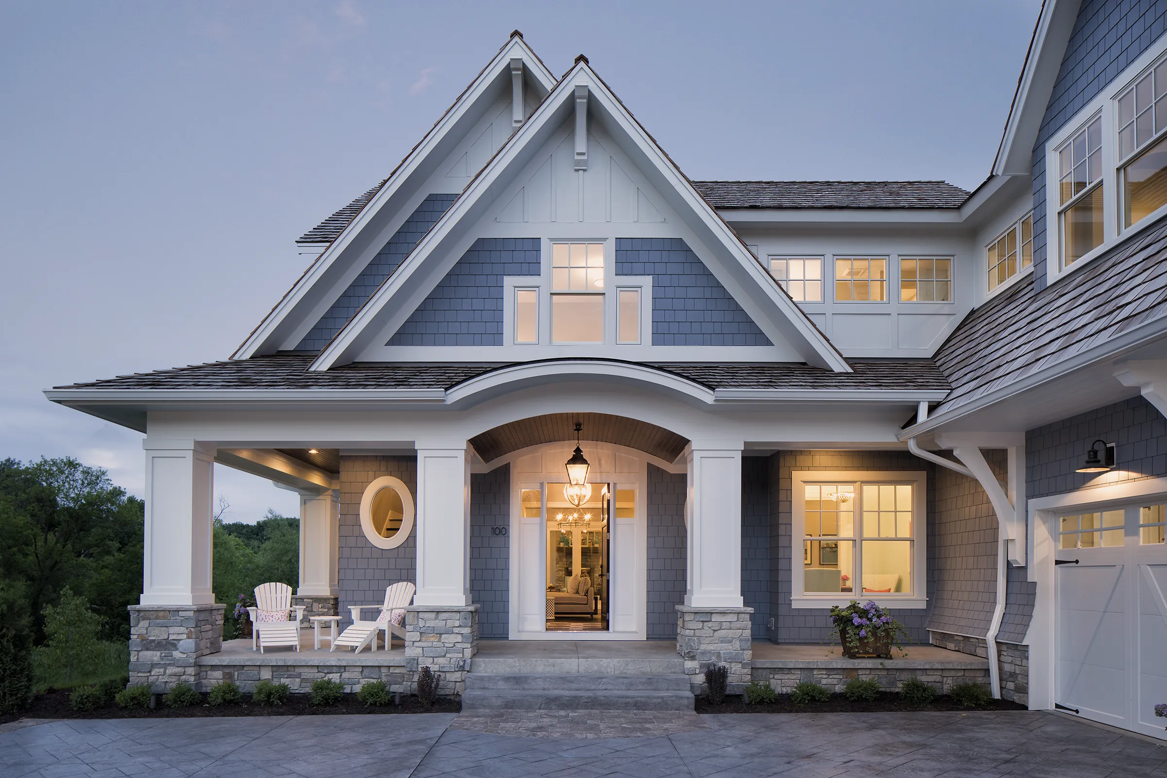 Lake home exterior with covered front porch