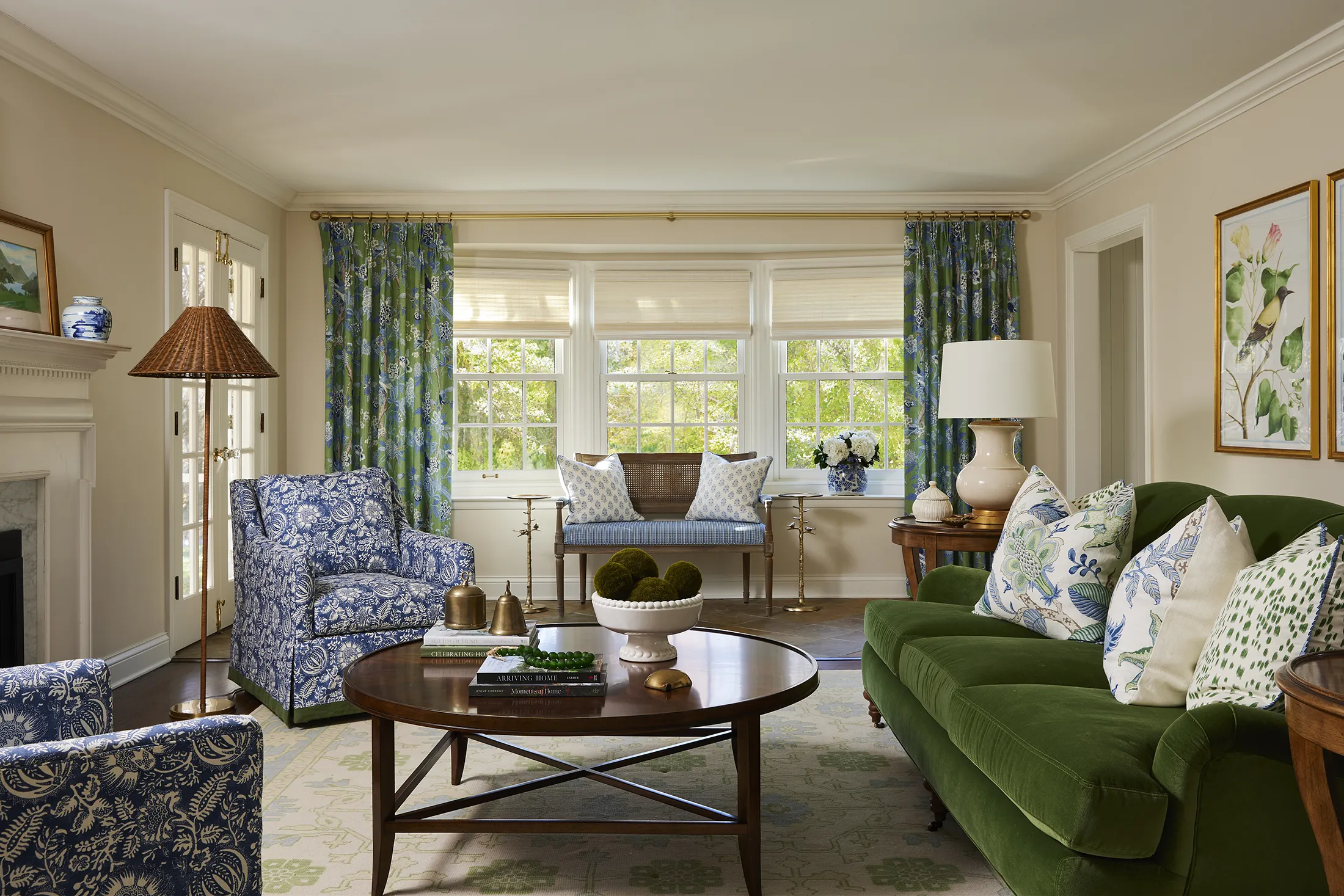 Traditional living room with green sofa and blue patterned furnishings